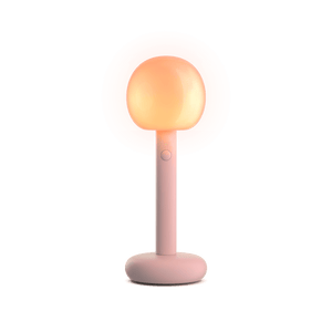 Fire Summer Edition von GRAU, kabellose LED-Tischleuchte in Rose mit warmem Licht und minimalistischem Design.